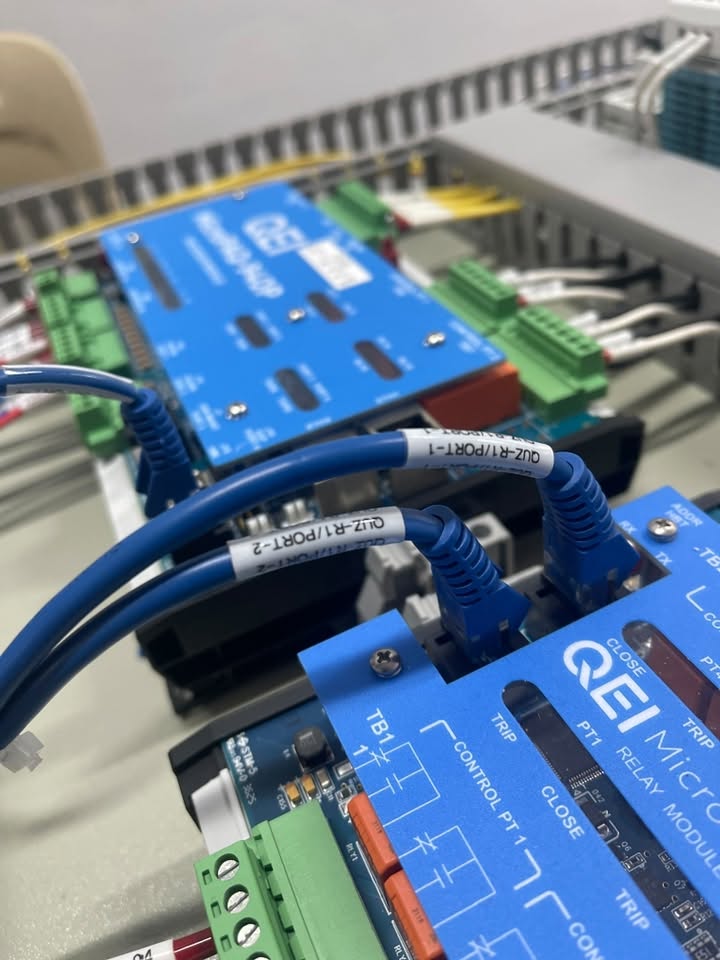 QEI Micro Relay Module installed in a substation panel with field wiring